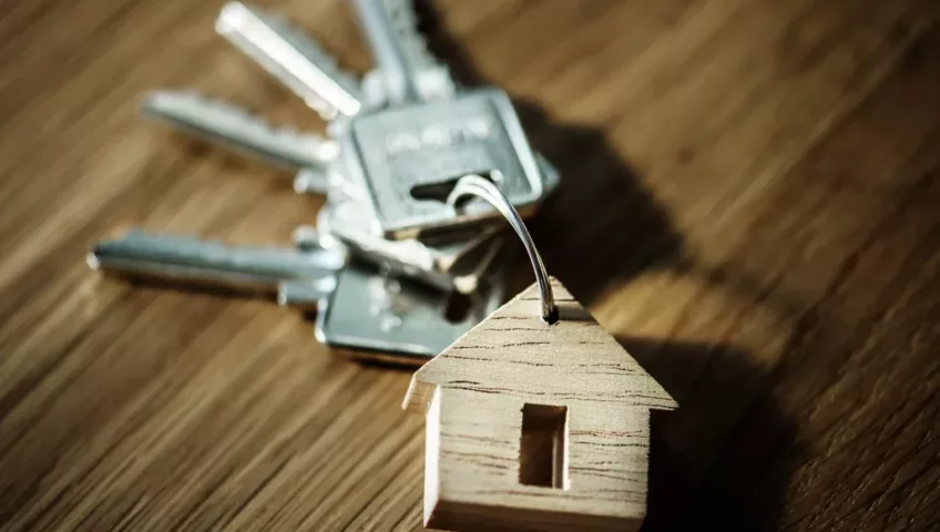 Home Renovation - photo of a key with a house keychain