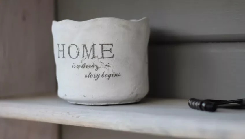 photo of a white basket with "home" written on it - home renovation tips