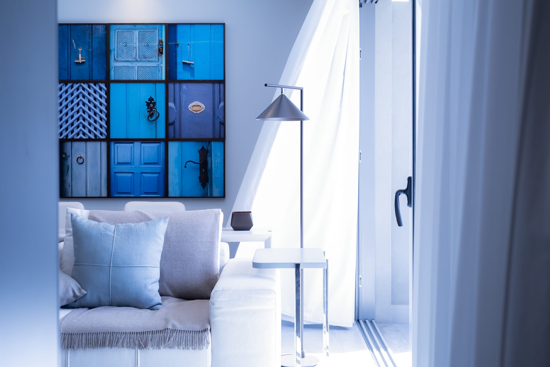 photo of a contemporary design living space with blue theme - home renovation tips